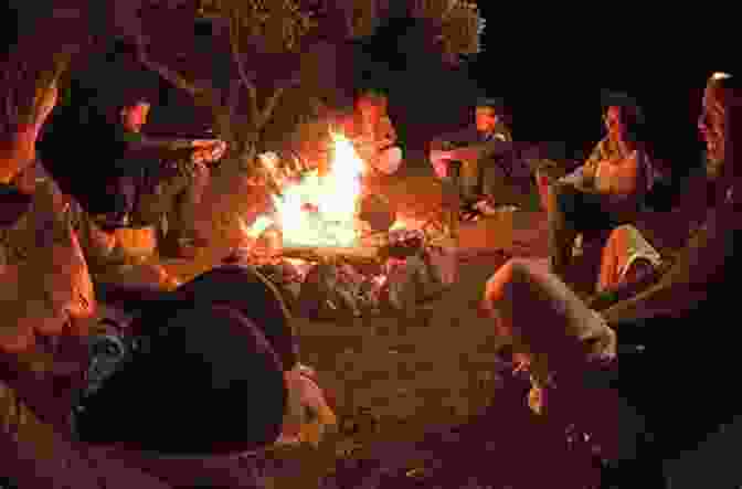 A Photograph Of A Group Of People Gathered Around A Campfire, Laughing And Sharing Stories. The Ascent Of Eli Israel And Other Stories