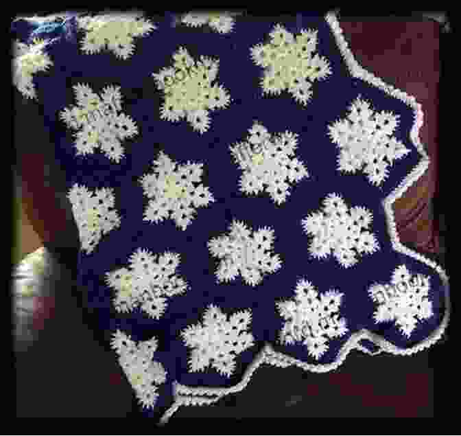 A Stunning Snowflake Blanket Afghan, Adorned With Intricate Snowflake Motifs, Providing Warmth And Comfort During Chilly Winter Nights. Knitting Pattern KP295 Snowflake Blanket Afghan 29 (74cm) X 30 (76cm) Hat 0 3mths 3 6mths UK Terms