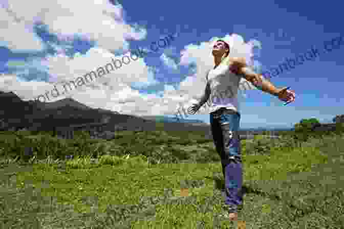 Frank Rutledge Standing In A Field, Arms Outstretched, Looking Towards The Horizon. He Is Surrounded By Nature, And His Expression Is One Of Peace And Freedom. The Image Symbolizes His Journey Of Acceptance And Growth. Clothed In August Skin Frank Rutledge